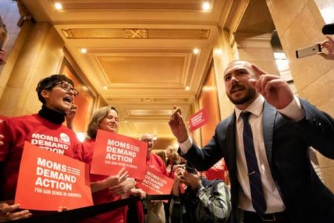 New State Rep. Hunter Cantrell, DFL-Savage, shown speaking to members of Moms Demand Action for Gun Sense in America in front of the House chamber as the group rallied for sensible gun laws.