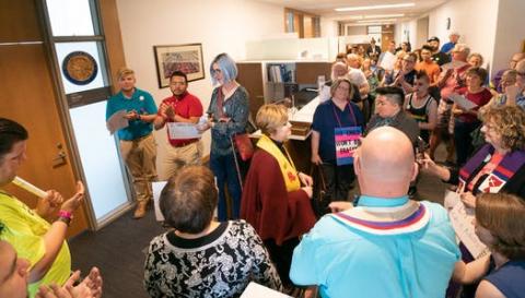 "Members of OutFront Minnesota and conversion therapy survivors told their stories at a rally outside Senate Majority Leader Paul Gazelka’s office on Wednesday." Photo by Glen Stubbe of the Star Tribune.