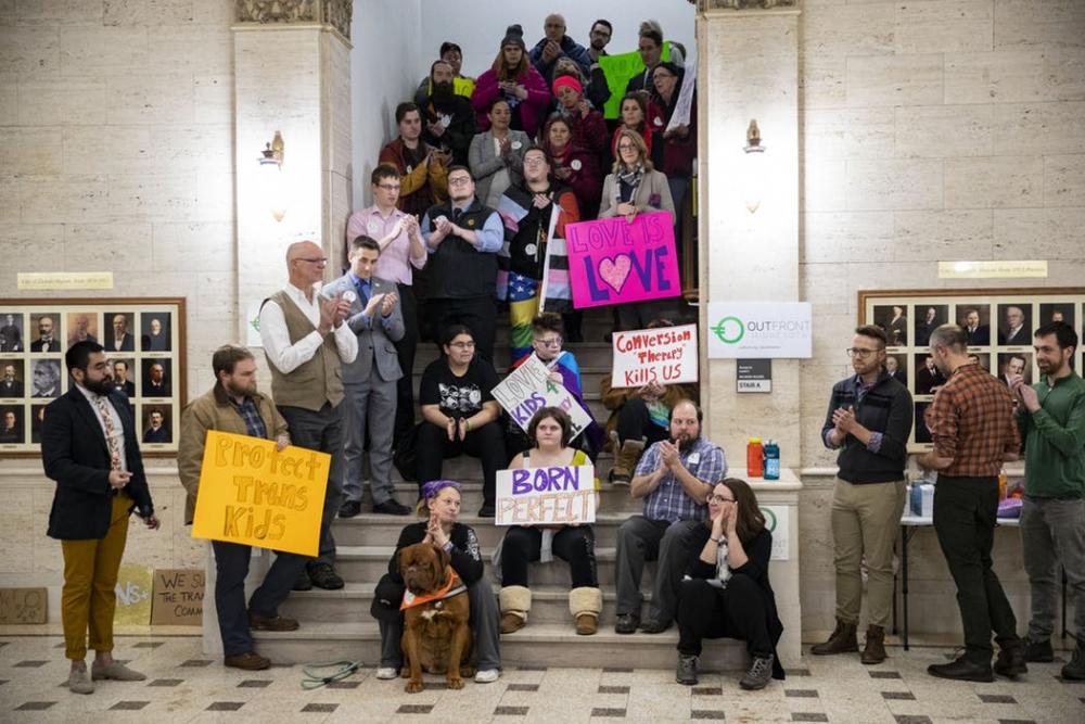 Approximately twenty people gathered to rally in the lobby of Duluth City Hall before the Duluth City Council voted on a law to ban conversion therapy. They were joined by four council members, two state legislatures and Mayor Emily Larson at the rally supporting the ban.