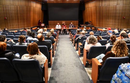 Outfront Minnesota Organizer Justin Lewandowski, National Council of Jewish Women Minnesota Executive Director Beth Gendler and CAIR-MN Executive Director Jaylani Hussein take part in a forum on bias Wednesday, Nov. 20, 2019, at the Miller Center at St. Cloud State University.