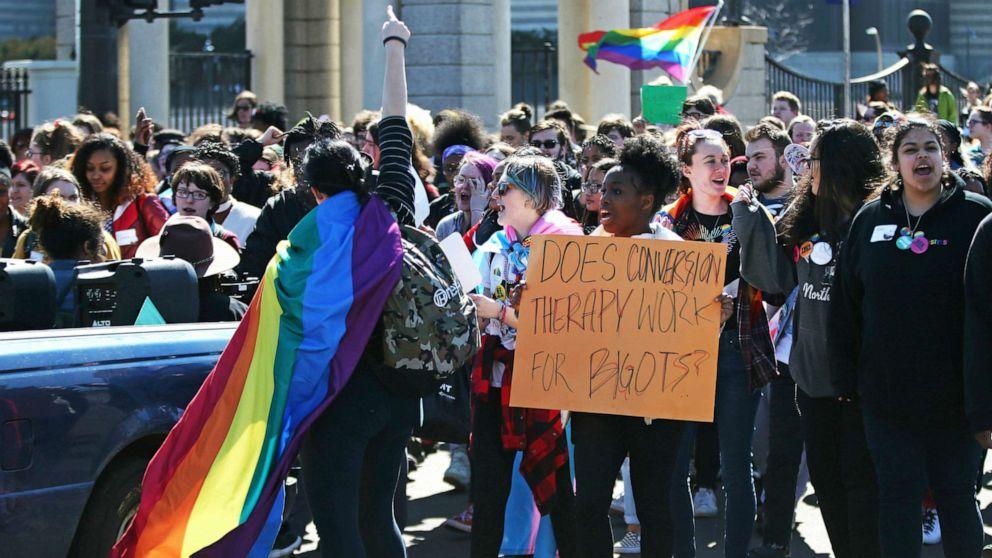 Scores of LGBTQ and allied high school students from across the state of Minnesota march to a rally at the State Cpitol to urge lawmakers to protect LGBTQ Minnesotans and youth from the effects of so-called conversion "therapy," March 21, 2019.